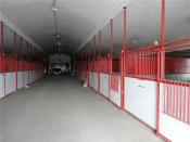 <p>Outside, you’ll find a 15-stall horse stable, as well as facilities for storing hay and equipment. (Realtor.ca) </p>