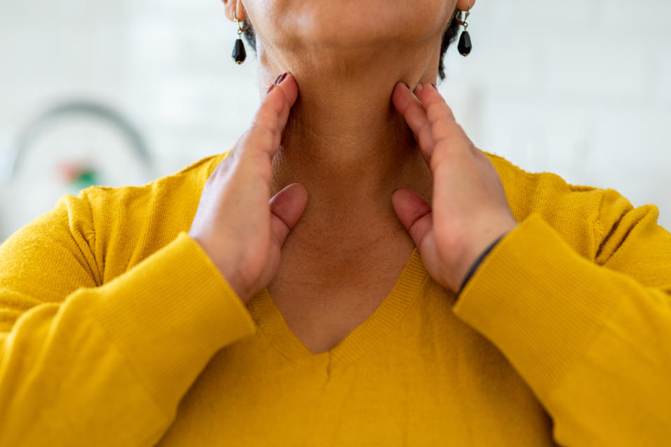 Woman with thyroid gland problem