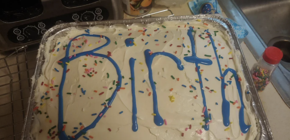 a cake that says "birth" on it