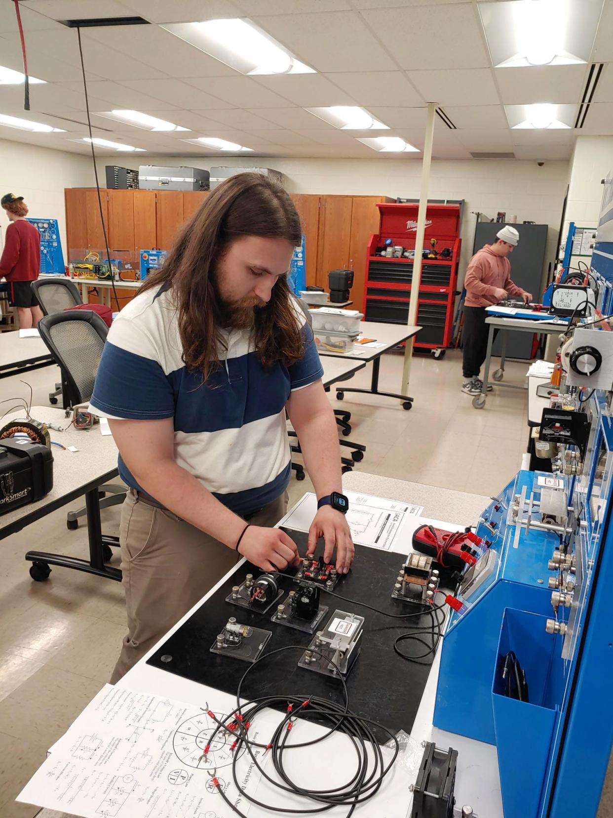 Brant Ogle, an HVAC student at Ivy Tech, works in a lab on the Bloomington campus this month as part of his industrial electrical course.
