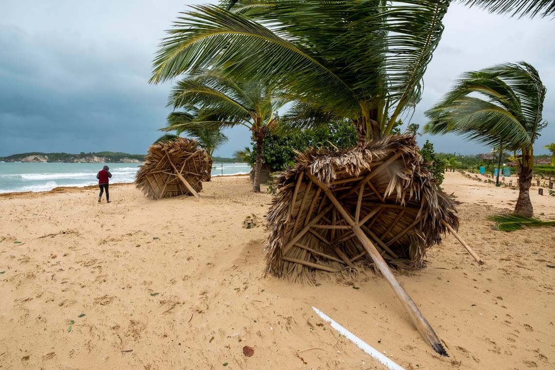 Broken umbrellas lay on the beach, felled by Hurricane Fiona in Punta Cana, Dominican Republic, Monday, Sept. 19, 2022. (AP Photo/Ricardo Hernandez)