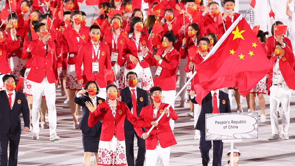 Pictured here, Team China at the opening ceremony for the Tokyo Games. 