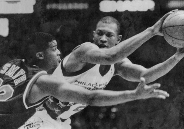 Courier Journal - Louisville Male High's Darrell Griffith, right
