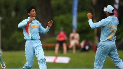 Saurabh Netravalkar of India celebrates his dismissal of Chris Dent of England (L) during the ICC U19 Cricket World Cup match between India and England at the Bert Sutcliffe Oval on January 21, 2010 in Lincoln, New Zealand