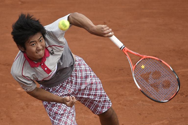 Japan's Yoshihito Nishioka went out in three sets to the fourth seed Tomas Berdych in the first round of the French Open on May 25, 2015