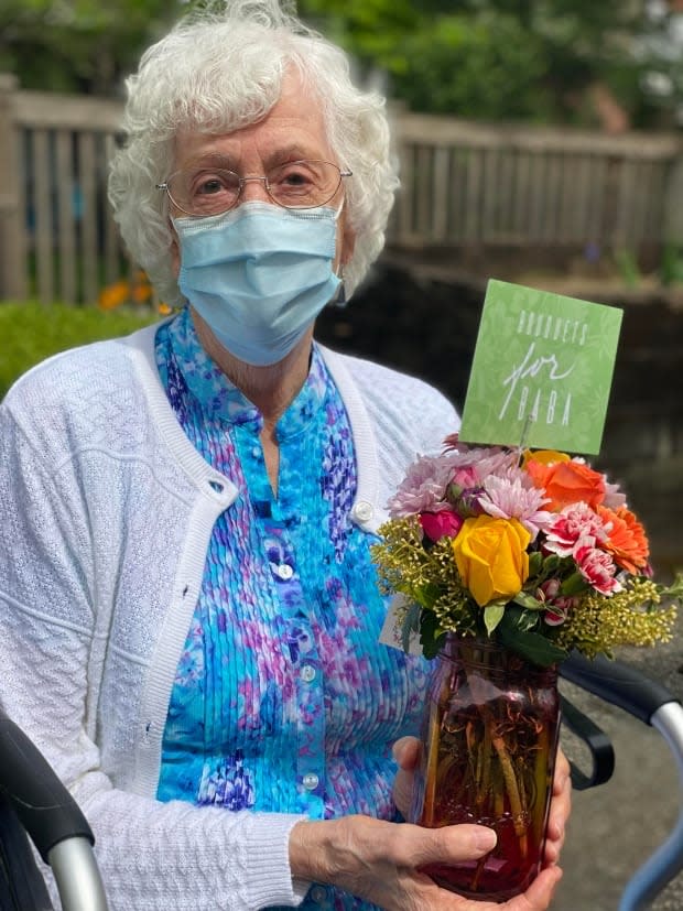 Senior Laurette Fortier said she loves being surrounded by flowers. They remind her of her late husband, who died eight years ago.