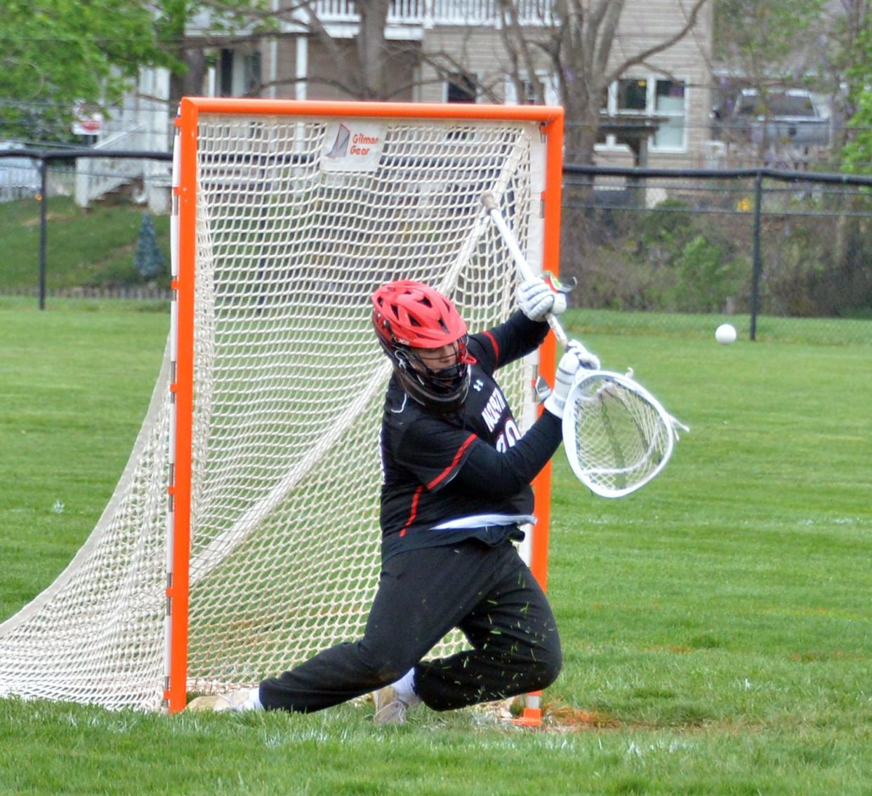 North Hagerstown's James Aleshire makes a save against Boonsboro.