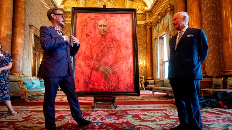 PHOTO: Artist Jonathan Yeo, left, and Britain's King Charles III at the unveiling of artist Yeo's portrait of the King, in the blue drawing room at Buckingham Palace, in London, May 14, 2024. (Aaron Chown/AP)