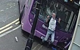 The double-decker bus's windscreens is seen to have shattered in the impact - Credit: Purple Turtle/SWNS