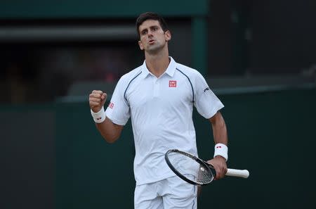 Tennis - Wimbledon - All England Lawn Tennis & Croquet Club, Wimbledon, England - 6/7/15 Men's Singles - Serbia's Novak Djokovic celebrates winning the fourth set during his fourth round match Mandatory Credit: Action Images / Tony O'Brien Livepic EDITORIAL USE ONLY.