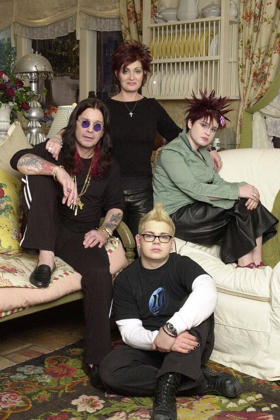 401831 01: (UNDATED PHOTO) The Osbournes, Ozzy (L), Sharon, Jack, and Kelly are shown in this undated photo. MTV officials said March 4, 2002 that Ozzy Osbourne, the heavy metal rock star and his family are the subject of a new MTV series, "The Osbournes," which premieres 10:30 p.m. EST Tuesday, March 5, 2002. MTV describes it as television's first "reality sitcom." (Photo by Michael Yarish/MTV/Getty Images)