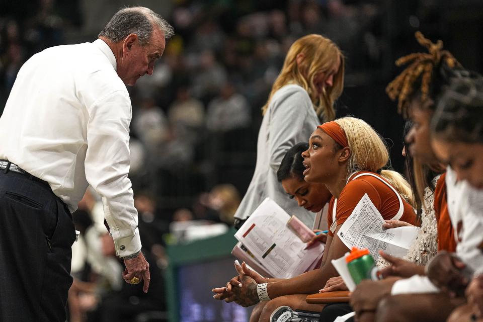 Texas head coach Vic Schaefer talks to forward Aaliyah Moore during the Feb. 1 win at Baylor. The No. 7 Longhorns enter their next two games on the road as the highest-ranked team in the Big 12 yet still in fourth place in the conference race.
