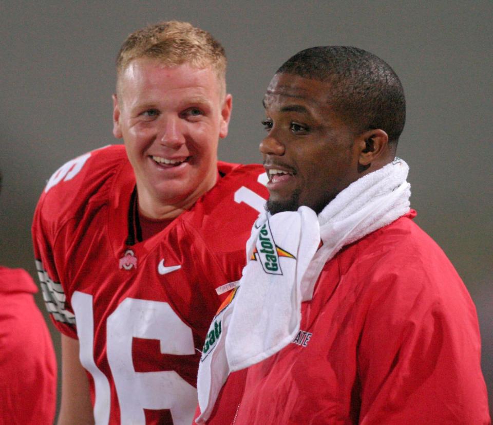 Craig Krenzel, left, on teammate Maurice Clarett: “He competed every day, knew his stuff and I never once questioned, not one time, when I dropped back did I think Reese was not going to do his assignment.”