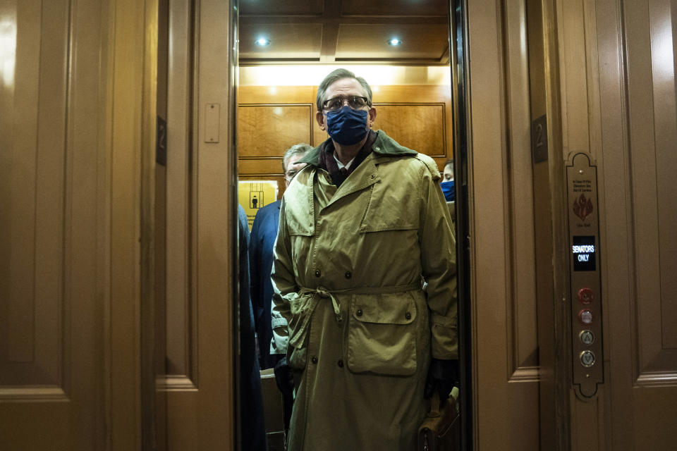 Bruce Castor, lawyer for former President Donald Trump, talks to reporters in the Senate Reception room on the fourth day of the Senate impeachment trial of former President Donald Trump on Capitol Hill on Friday, Feb 12, 2021, in Washington. (Jabin Botsford//The Washington Post via AP, Pool)