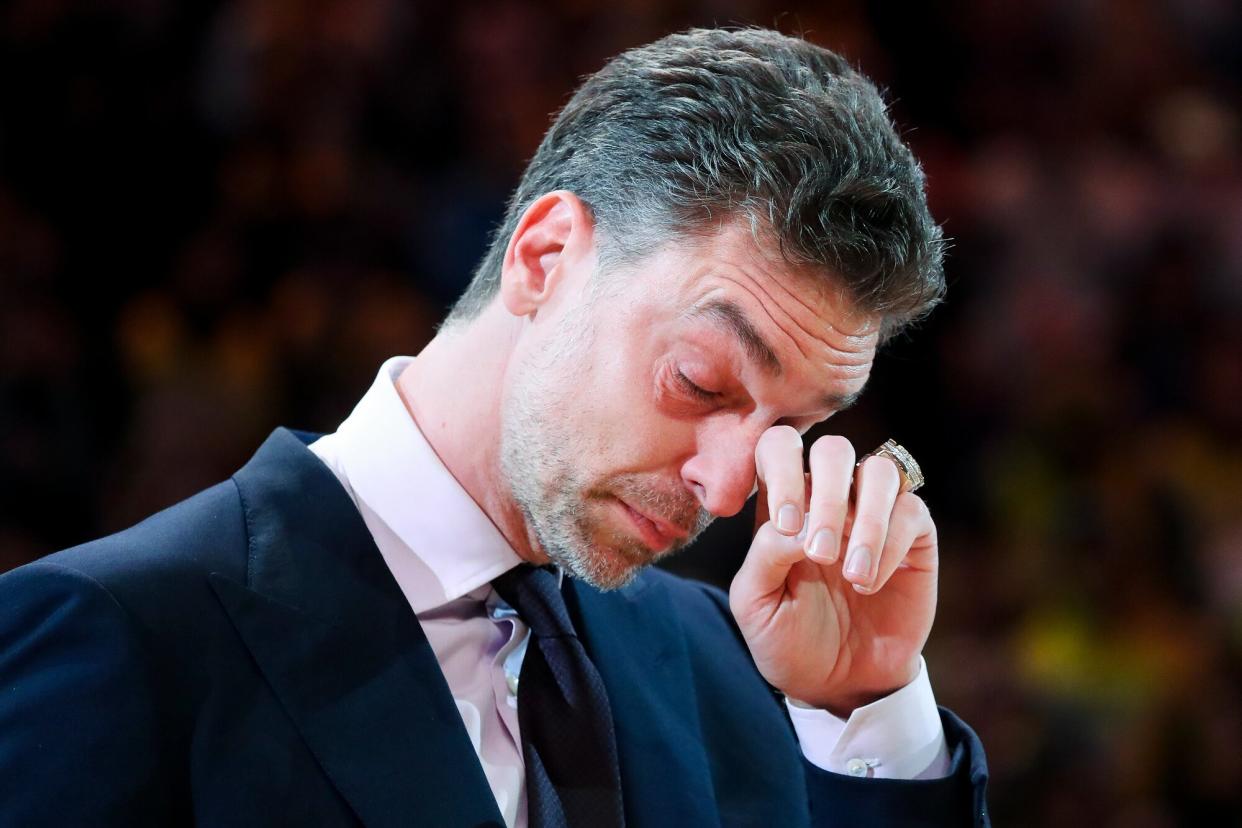 Former Los Angeles Lakers Pau Gasol wipes tears away as his jersey #16 is retired during a halftime ceremony during the game against the Memphis Grizzlies in an NBA game at Crypto.com Arena in Los Angeles on Tuesday, Mar. 7, 2023.