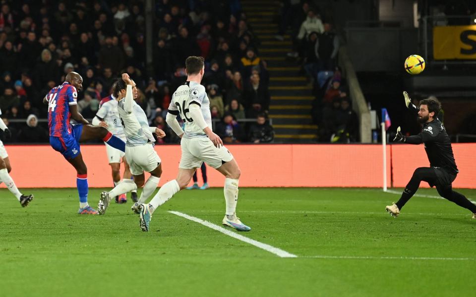 Alisson saves from Crystal Palace's Jean-Philippe Mateta - Liverpool's recent top-four charge appears a false dawn after Palace stalemate - Getty Images/Glyn Kirk