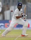 Cricket - Sri Lanka v India - First Test Match - Galle, Sri Lanka - July 26, 2017 - India's cricketer Ajinkya Rahane plays a shot. REUTERS/Dinuka Liyanawatte