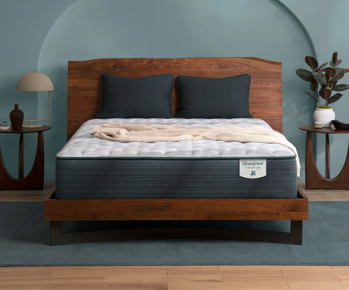  A Beautylux Harmony Lux mattress on a wooden bedframe. 