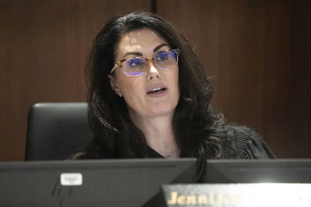 Waukesha County Circuit Court Judge Jennifer Dorow addresses Darrell Brooks during his trial in Waukesha County Circuit Court on Oct. 25, 2022, in Waukesha, Wis. (Mark Hoffman/Milwaukee Journal-Sentinel via AP, Pool, File)