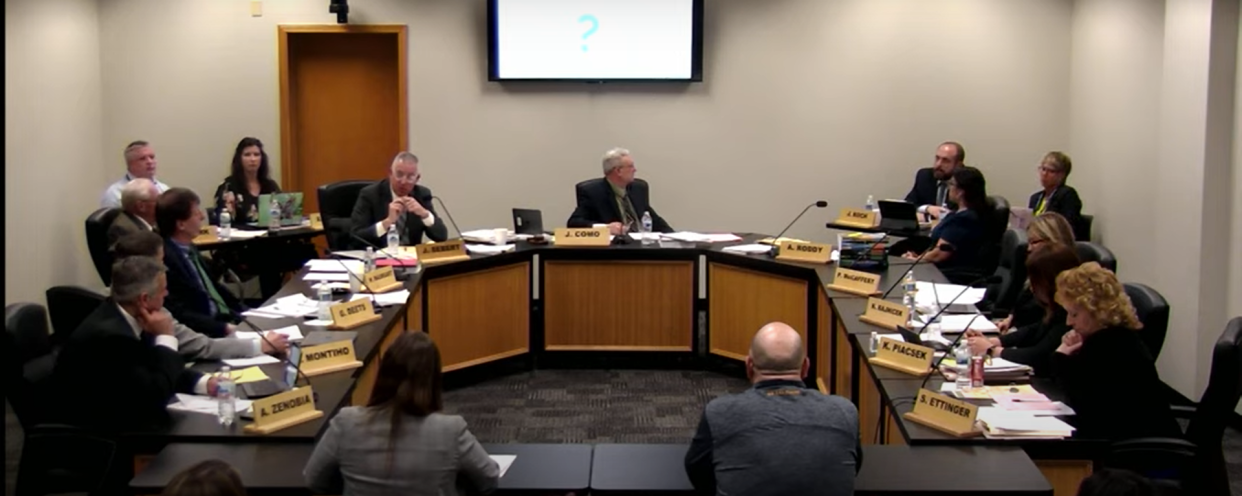 Waukesha School District deputy superintendent Joe Koch discusses the school's Pay To Ride bus program as part of discussion on a merger of Whittier and Hadfield Elementary Schools at the board's March 9 meeting. The board passed the merger 5-3.