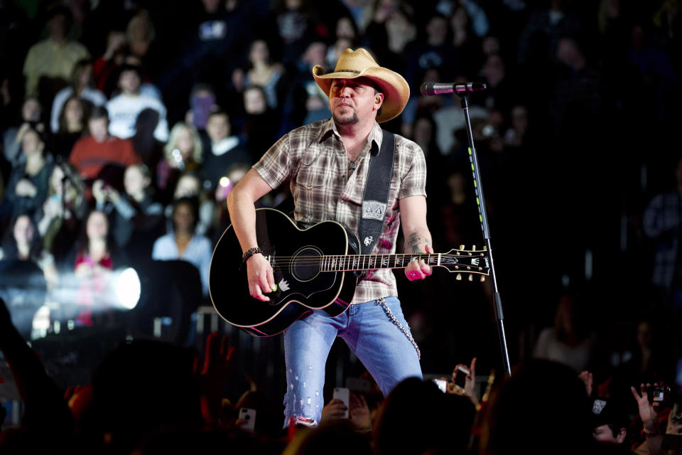 FILE - In this March 2, 2013 file photo, Jason Aldean performs in concert at Madison Square Garden in New York. The first iHeartRadio Country Festival will be held March 29, 2014, in Austin, Texas, with Luke Bryan, Jason Aldean, Eric Church, Carrie Underwood, Lady Antebellum and Florida Georgia Line heading up the initial lineup. (Photo by Charles Sykes/Invision/AP, file)