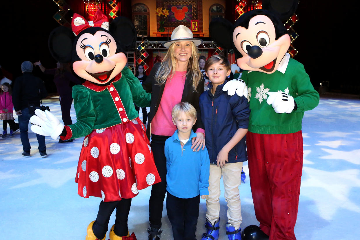 LOS ANGELES, CA - DECEMBER 11:  (L-R) Actress Anne Heche, son Atlas, and son Homer attend Disney On Ice Presents Let's Celebrate! Presented By Stonyfield YoKids Organic Yogurt Celebrity Premiere & Skating Party at Staples Center on December 11, 2014 in Los Angeles, California.  (Photo by Ari Perilstein/Getty Images for Feld Entertainment)
