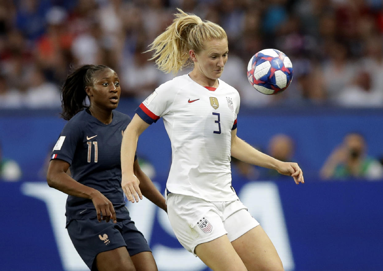 United States' Samantha Mewis, right, attempts to control the ball as France's Kadidiatou Diani watches during the Women's World Cup quarterfinal soccer match between France and the United States at Parc des Princes in Paris, France, Friday, June 28, 2019. (AP Photo/Alessandra Tarantino)