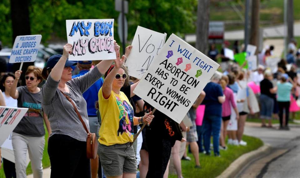 In response to the Supreme Court overturning Roe v. Wade, the Johnson County Democratic Party and Kansas Democrats hosted a demonstration Sunday in Johnson County near College Blvd. and Roe Ave., to demand defense of reproductive freedoms in Kansas. Participants called on Republican candidate Amanda Adkins to stand up for a person’s right to choose and defend reproductive freedoms. The decision overturned 50 years of precedent and allows states to restrict access to essential health care.