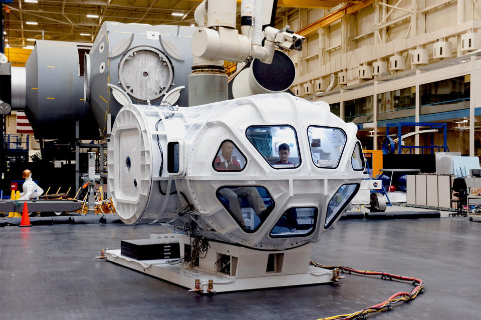 Astronauts practice in the Multi-Mission Space Exploration Vehicle (MMSEV) simulator at the Johnson Space Center. This is the in-space version of the vehicle, which allows astronauts to operate in a pressurized 