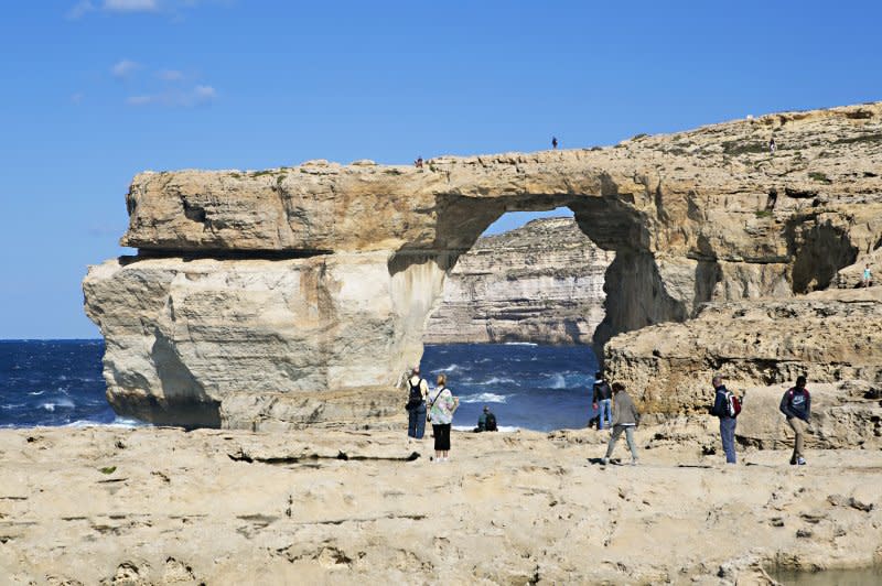 On March 7, 2017, Malta's iconic Azure Window, a natural rock arch pictured in 2014, collapsed into the sea during a storm. File Photo by Domenic Aquilina/EPA