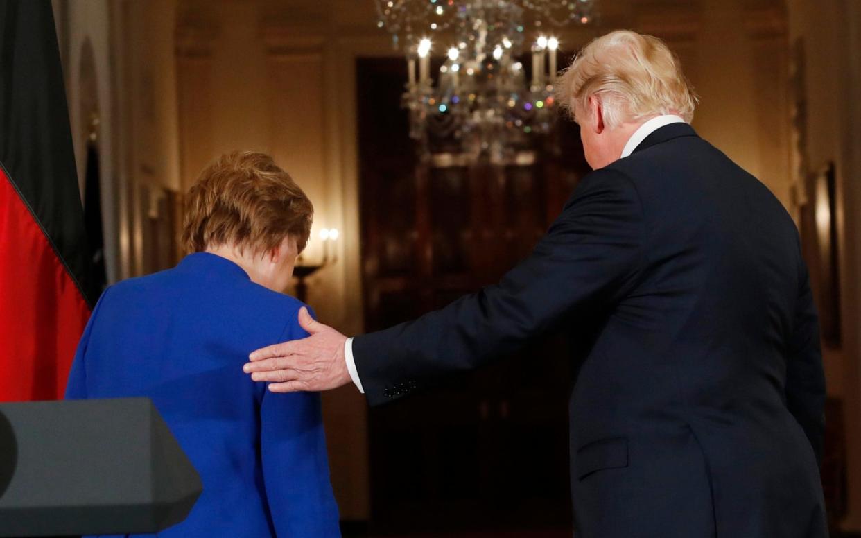 Mr Trump and Mrs Merkel met at the White House in late April - REUTERS