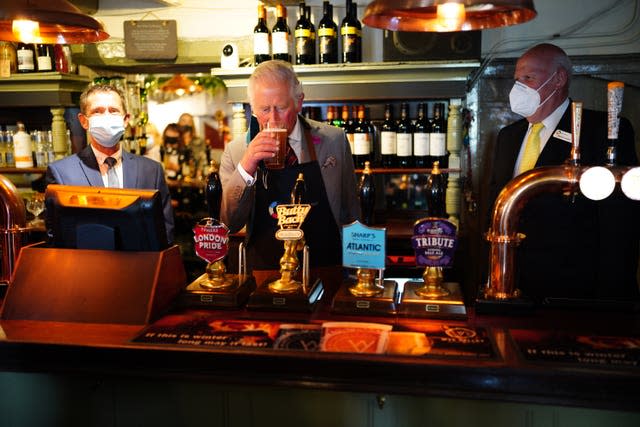 The Prince of Wales tries some Butty Bach (a Welsh term meaning ‘little friend’) ale during a visit to Ponthir House Inn (Ben Birchall/PA)