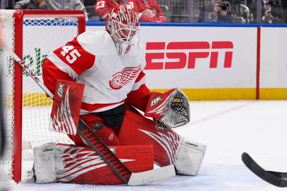 Detroit Red Wings goaltender Magnus Hellberg (45) makes a save against New York Islanders during the second period at UBS Arena in Elmont, New York, on Friday, Jan. 27, 2023.