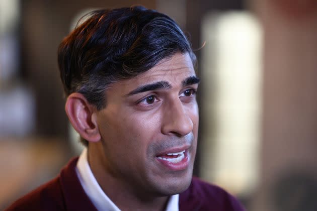 LONDON, ENGLAND - MAY 6: Britain's Prime Minister Rishi Sunak speaks to members of the media during a visit to Omnom, a restaurant and community centre in north London on May 6, 2024 in London, England. (Photo by Henry Nicholls-WPA Pool/Getty Images)