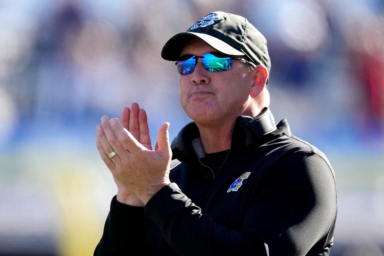 Kansas head coach Lance Leipold celebrates after a Kansas touchdown during the first half of an NCAA college football game against Oklahoma State Saturday, Nov. 5, 2022, in Lawrence, Kan. (AP Photo/Charlie Riedel)