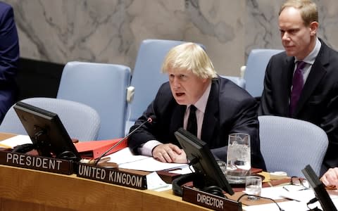 Matthew Rycroft sitting behind Boris Johnson, the former Foreign Secretary, at the UN last year - Credit: Richard Drew/AP