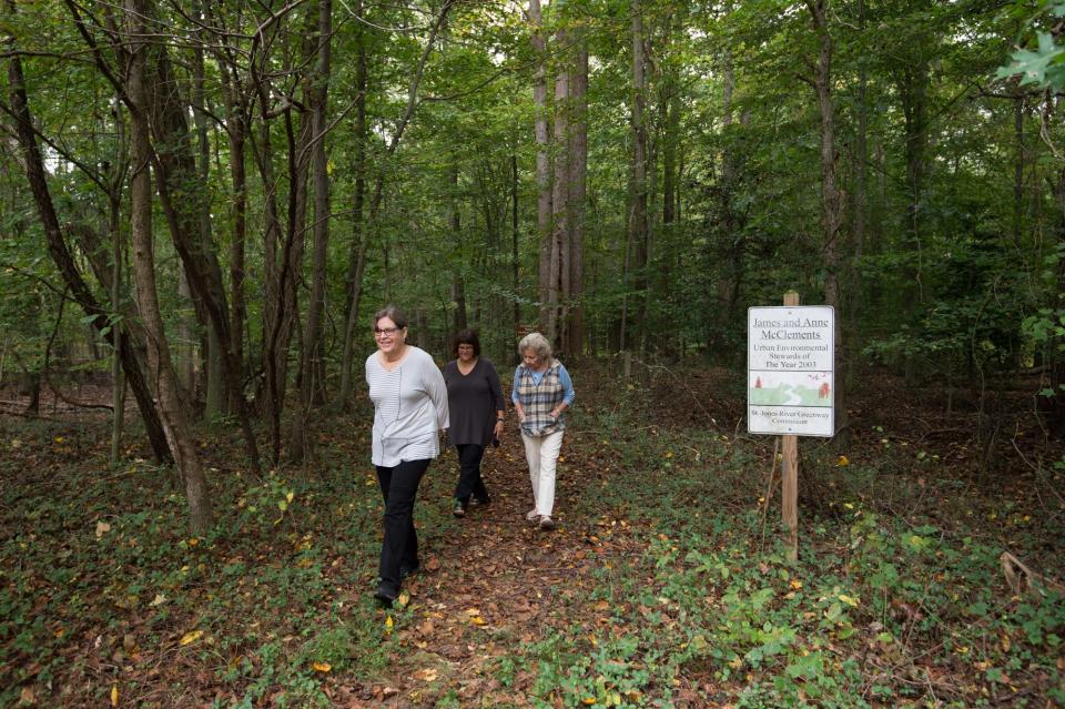 Dr. Mary Jane McClements, left, of Milton and Nancy McClements and Ruth McClements of Dover at the trail entrance for the Fork Branch Trail in Dover in October 2017.