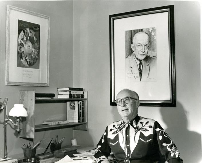 Floyd Odlum pictured in his office at his Indio Ranch in 1963, with portrait of President Eisenhower on the wall.