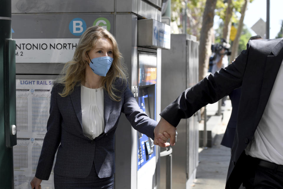 Elizabeth Holmes leaves the United States Federal Courthouse in San Jose, Calif., Wednesday, Sept. 8, 2021. Her company Theranos failed in 2018, a few years after a series of explosive stories in The Wall Street Journal exposed serious flaws in its technology and spurred regulatory investigations that shut down the testing. (AP Photo/Nic Coury)