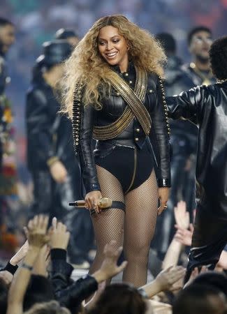 Beyonce smiles after performing during the half-time show at the NFL's Super Bowl 50 football game between the Carolina Panthers and the Denver Broncos in Santa Clara, California February 7, 2016. REUTERS/Lucy Nicholson