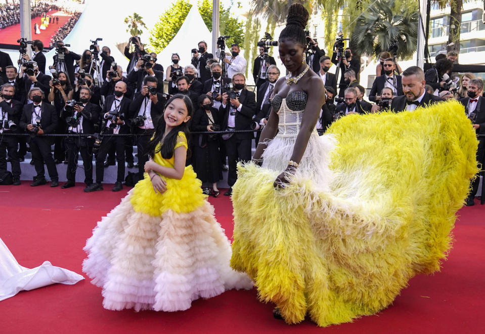 FILE - In this July 8, 2021 file photo Malea Emma Tjandrawidjaja, left, and Jodie Turner-Smith pose for photographers upon arrival at the premiere of the film 'Stillwater' at the 74th international film festival, Cannes, southern France. (AP Photo/Brynn Anderson, File)