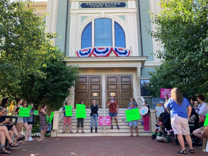 At an abortion rights rally held Friday at Provincetown Town Hall speakers including state Sen. Julian Cyr, D-Truro, (center) urged attendees to vote, to join together and to continue to fight for abortion rights.