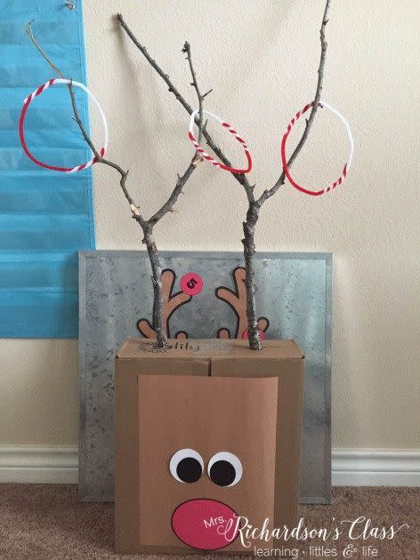 <p>Did somebody say reindeer games? Send the kids out back to find the perfect V-shaped sticks to use as the antlers, then enlist their help in making pipe-cleaner rings and painting a goofy Rudolph face onto a leftover shipping box for a base. </p><p><em><a href="http://www.mrsrichardsonsclass.com/reindeer-holiday-party-freebie/" rel="nofollow noopener" target="_blank" data-ylk="slk:Get the tutorial at Mrs. Richardson's Class »;elm:context_link;itc:0;sec:content-canvas" class="link ">Get the tutorial at Mrs. Richardson's Class »</a></em><br></p>