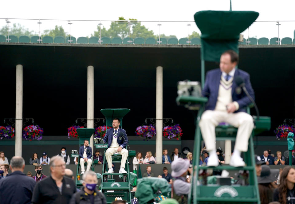 <p>A general view of umpires overlooking the outdoor courts on day three of Wimbledon at The All England Lawn Tennis and Croquet Club, Wimbledon. Picture date: Wednesday June 30, 2021.</p>
