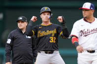 Pittsburgh Pirates' Henry Davis celebrates his double during the sixth inning of an opening-day baseball game against the Washington Nationals at Nationals Park, Monday, April 1, 2024, in Washington. (AP Photo/Alex Brandon)