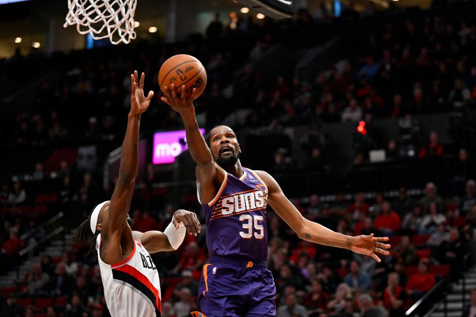 Kevin Durant #35 of the Phoenix Suns shoots during the fourth quarter of the game against the Portland Trail Blazers at the Moda Center on Dec. 19, 2023, in Portland, Oregon. The Portland Trail Blazers won 109-104.