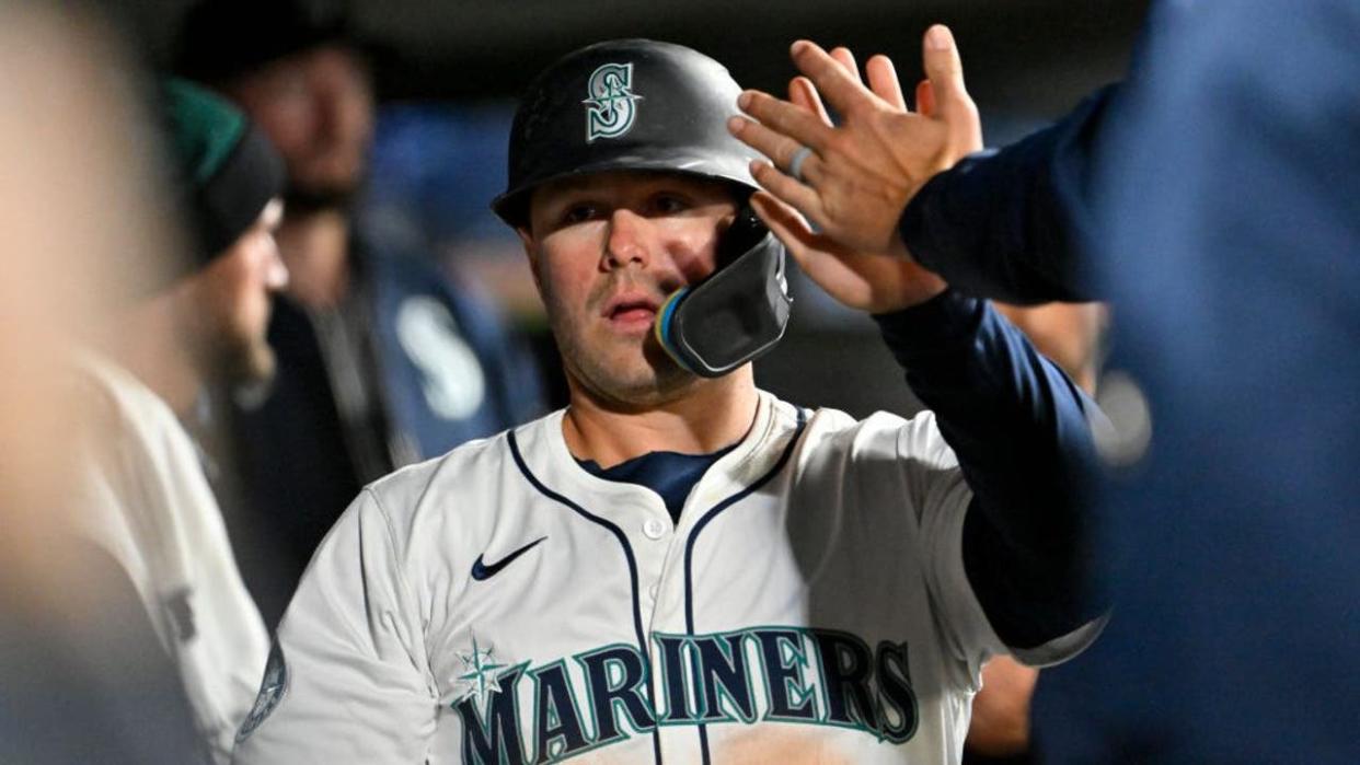 <div>SEATTLE, WASHINGTON - APRIL 02: Ty France #23 of the Seattle Mariners celebrates with teammates after scoring during the seventh inning against the Cleveland Guardians at T-Mobile Park on April 02, 2024 in Seattle, Washington.</div> <strong>(Alika Jenner / Getty Images)</strong>