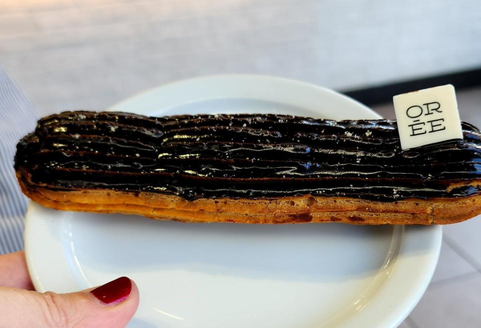 A perfect chocolate éclair from Oree, a French patisserie in Richmond. It was filled with chocolate cream.