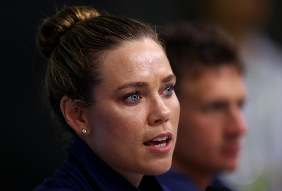 SHANGHAI, CHINA - JULY 23: (L-R) Natalie Coughlin and Ryan Lochte of the United States participate in a press conference on Day Eight of the 14th FINA World Championships at the Main Press Center of the Oriental Sports Center on July 23, 2011 in Shanghai, China. (Photo by Quinn Rooney/Getty Images)