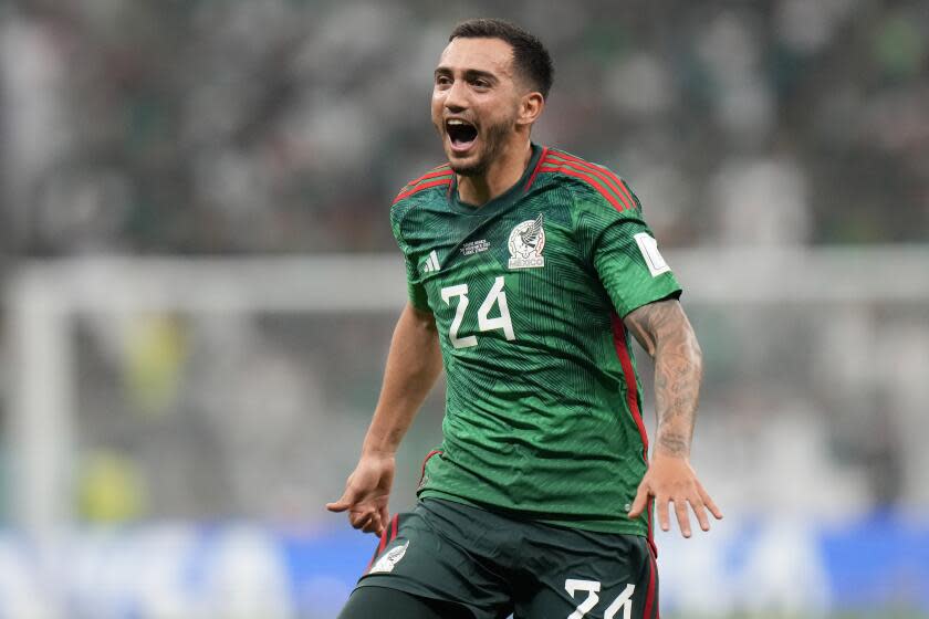 Mexico's Luis Chavez celebrates scoring his side's second goal during the World Cup group C soccer match between Saudi Arabia and Mexico, at the Lusail Stadium in Lusail, Qatar, Wednesday, Nov. 30, 2022. (AP Photo/Moises Castillo)
